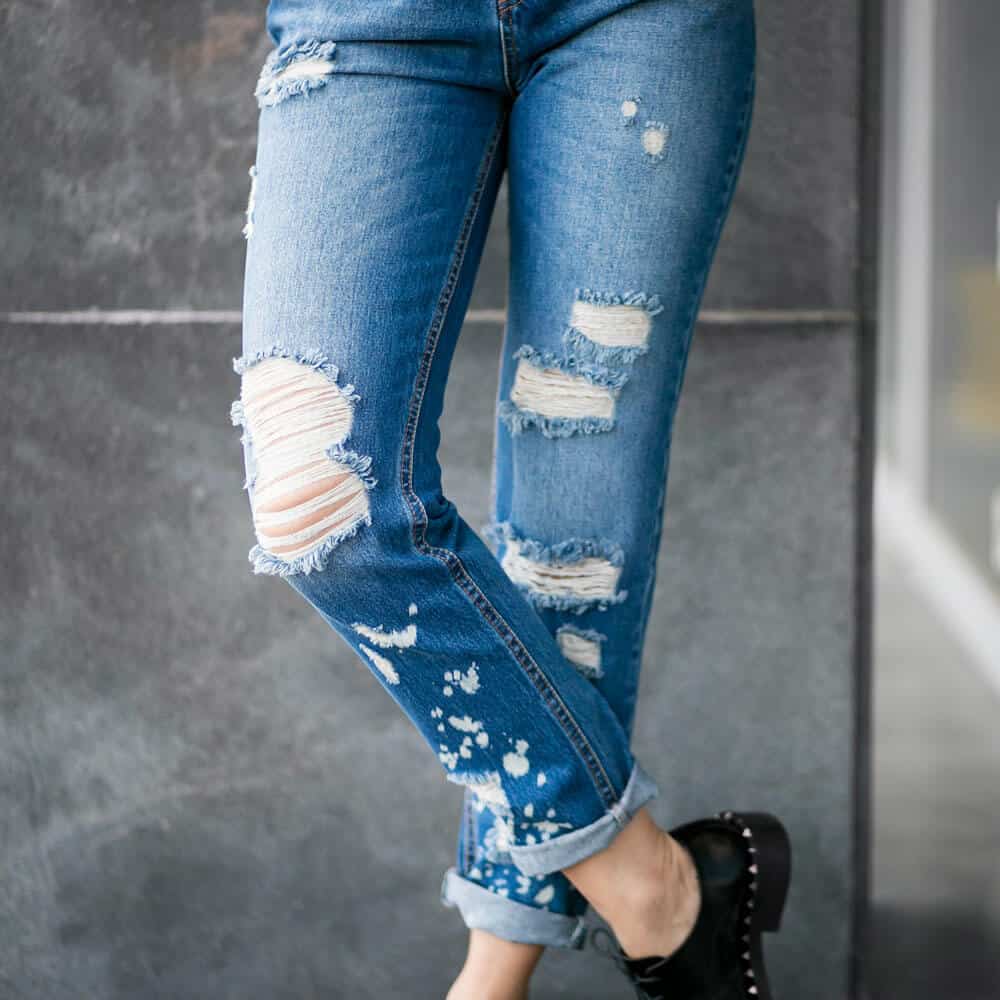 torn jeans and white shirt